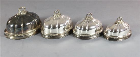 A set of four 19th century Sheffield plate graduated domed meat dish covers, largest 43.2cm.